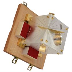 1990s Swiss silver and gold plated cube sundial, the top face of the cube with inset compass and gold plated gnomon, engraved to four sides with degrees of latitude, engraved to lower portion of one side 1993 Walther Signer Zurich, 925, contained within a fitted wooden box