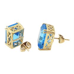 Pair of 9ct gold emerald cut blue topaz stud earrings, stamped, total topaz weight approx 16.05 carat
