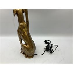 Composite table lamp, modelled as a gilt seated whippet, with teal velvet shade, H71cm
