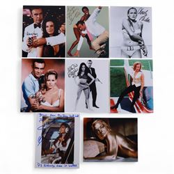 Eight James Bond signed 10 x 8
