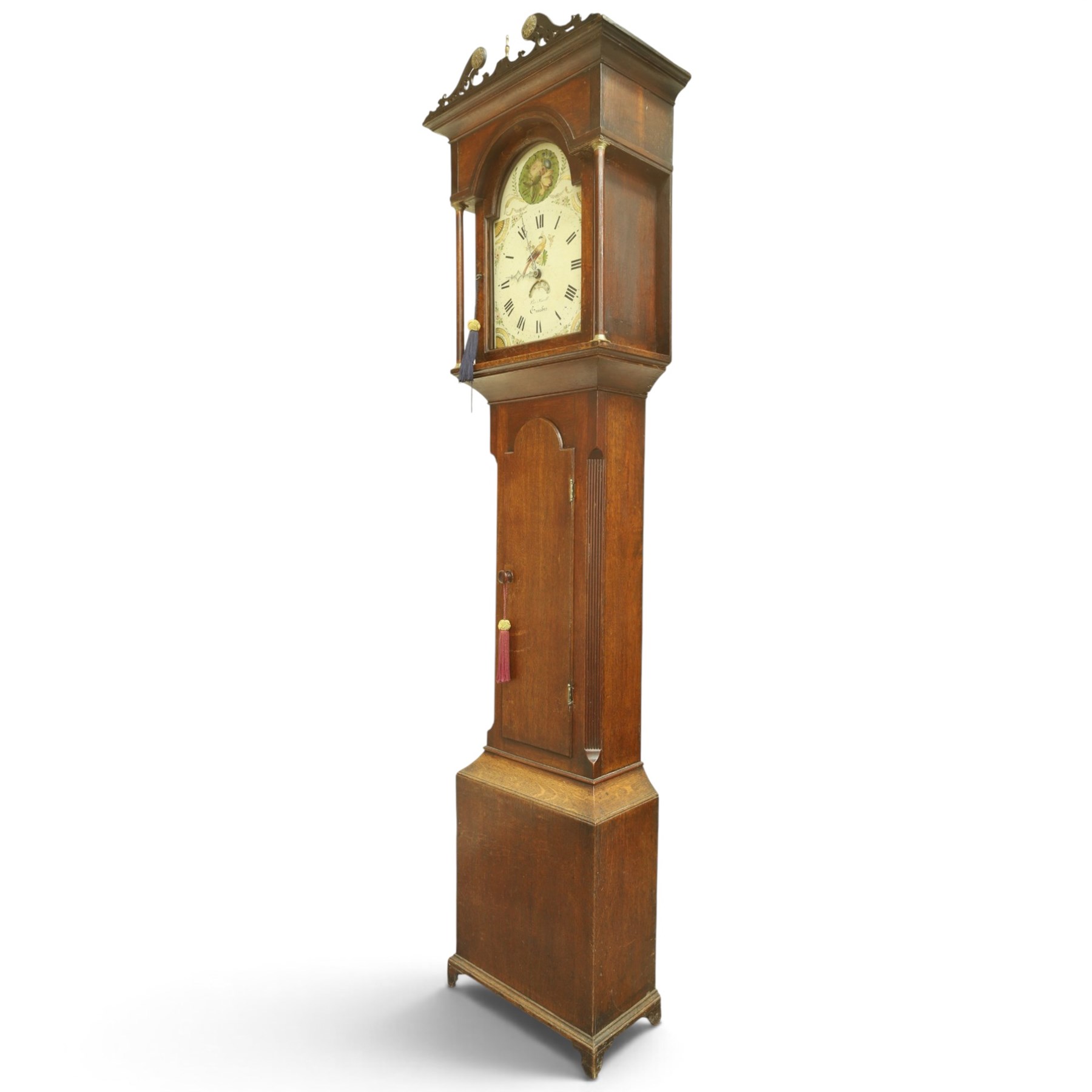Thomas Small of Guisborough - George III oak eight-day longcase clock, the painted arched dial with calendar aperture, bird and floral decoration, the case with pierced fretwork broken swan-neck pediment and pilasters, reeded canted sides flanking arched trunk door