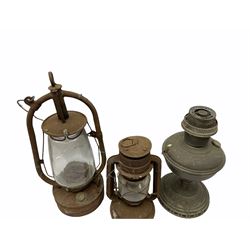 303 metal bound wooden ammunition box with folding handles, H23cm W40.5cm, together with three oil lamps. 
