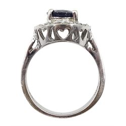 White gold oval sapphire and diamond cluster ring, stamped 14K, sapphire approx 2.00 carat