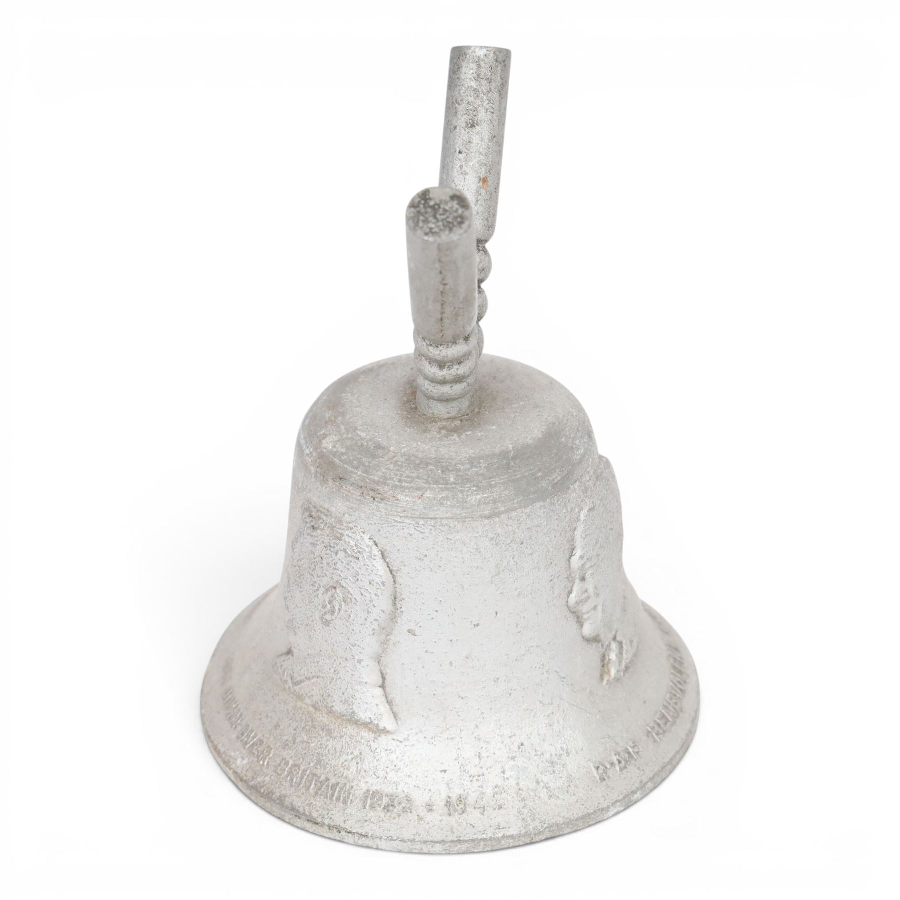 R.A.F. benevolent fund victory bell, cast in metal from German aircraft shot down over Britain 1939-1945, decorated in relief with allied leader, H19cm 
