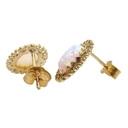  Pair of 9ct gold filigree set opal stud earrings  