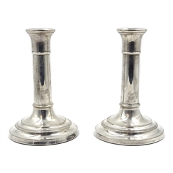  Pair of Georgian style silver candlesticks by John Bull Ltd New Bond Street London 1996 weighted 14.5cm  