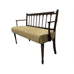 Edwardian walnut settee, reed moulded upright back over sprung seat upholstered in lozenge pattern fabric, square tapering supports with spade feet