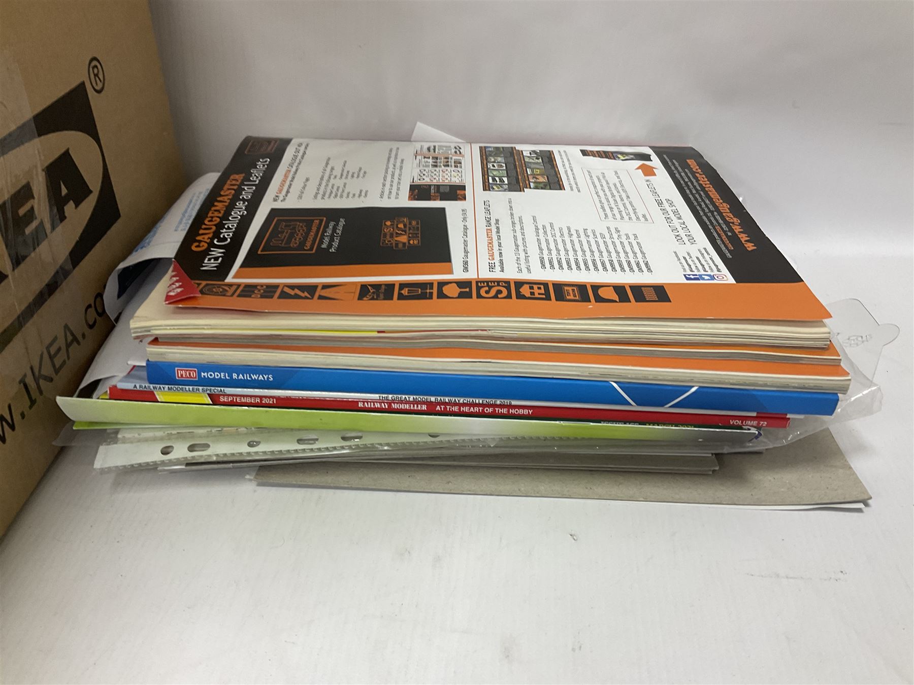 Extensive collection of scratch built buildings for use on ‘00’ gauge model railway layout, small amount of accessories and tools with a quantity of railway magazines and leaflets, in three boxes 