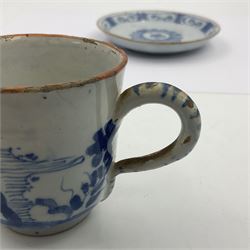 Rare 18th century English delft coffee cup and saucer, circa 1760, probably Liverpool, the cup painted with rockwork, flowers and bird, the saucer painted with central stylised flower head and lattice and scroll border, cup H6cm, saucer D10.5cm