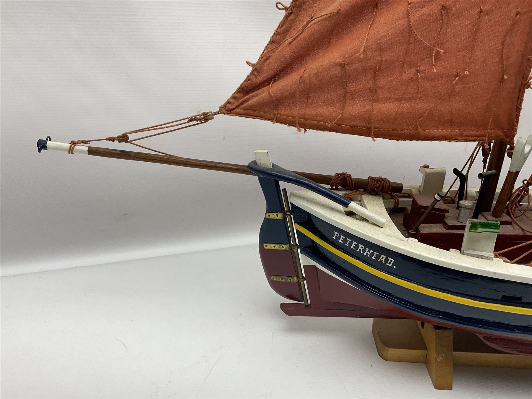 Wooden model of the Peterhead Herring Fishing Boat, Love Divine, PD404. on stand together with Wick Herring Fishing Boat, Galilee WK.1. on stand, L105cm, H64cm