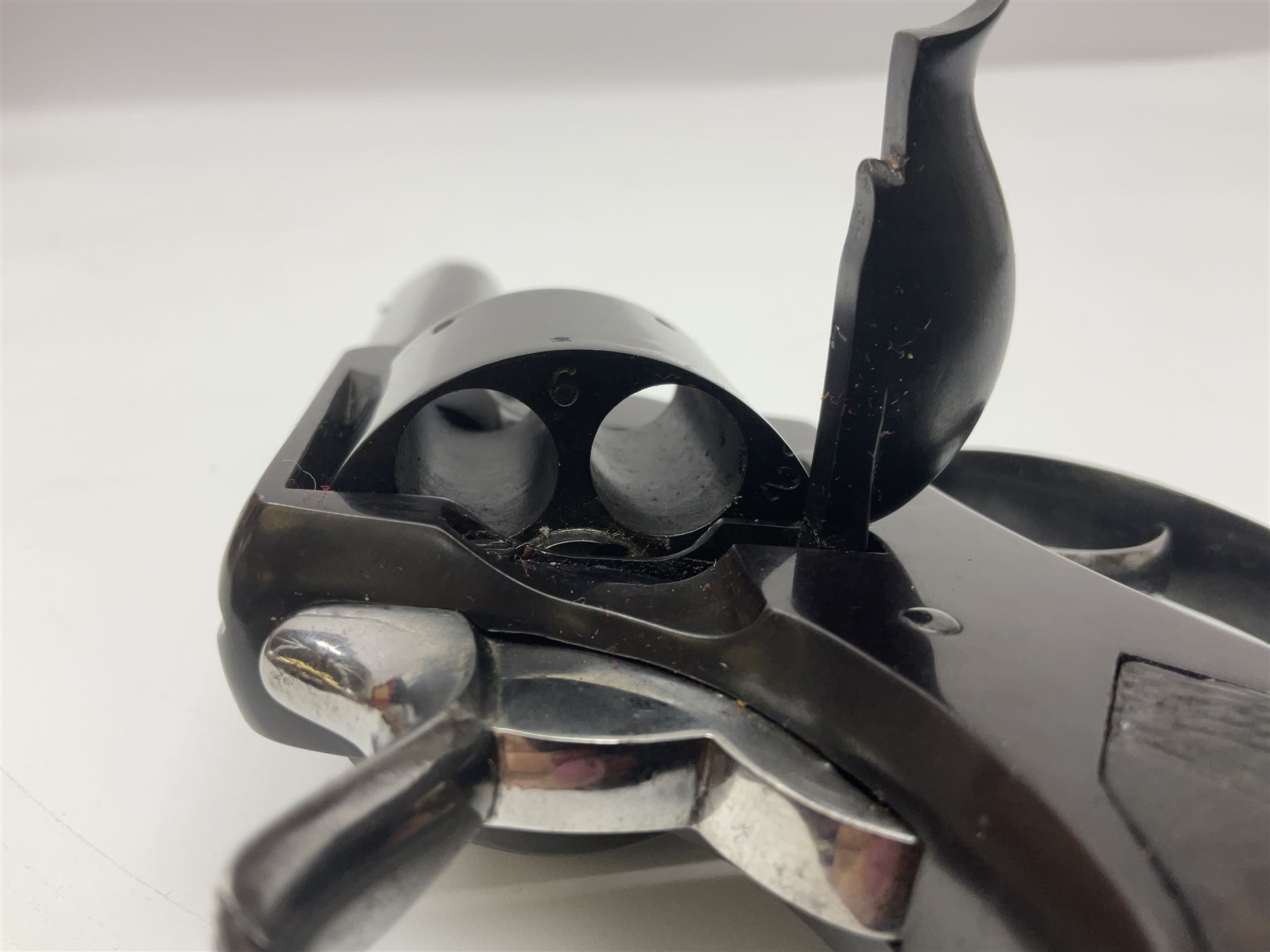 Scarce Webley & Scott .430 short six-shot revolver retailed by S.W. Silver & Co of Cornhill, London; round barrel with captive swivel ejector under; chequered walnut one-piece grip; numbered 12627 with various maker's marks L26cm overall; in fitted oak case with trade label to lid, cleaning rod, screw-driver and oil bottle