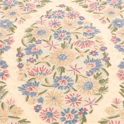 Kashmiri chain stitch crewel embroidered wall hanging, wool on cotton ground, decorated with an all-over lattice of floral medallions and stylized foliage with multiple floral borders