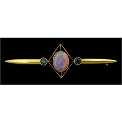 Early 20th century gold opal and sapphire bar brooch, the central milgrain set opal, with a round cut sapphire set either side, stamped 15ct