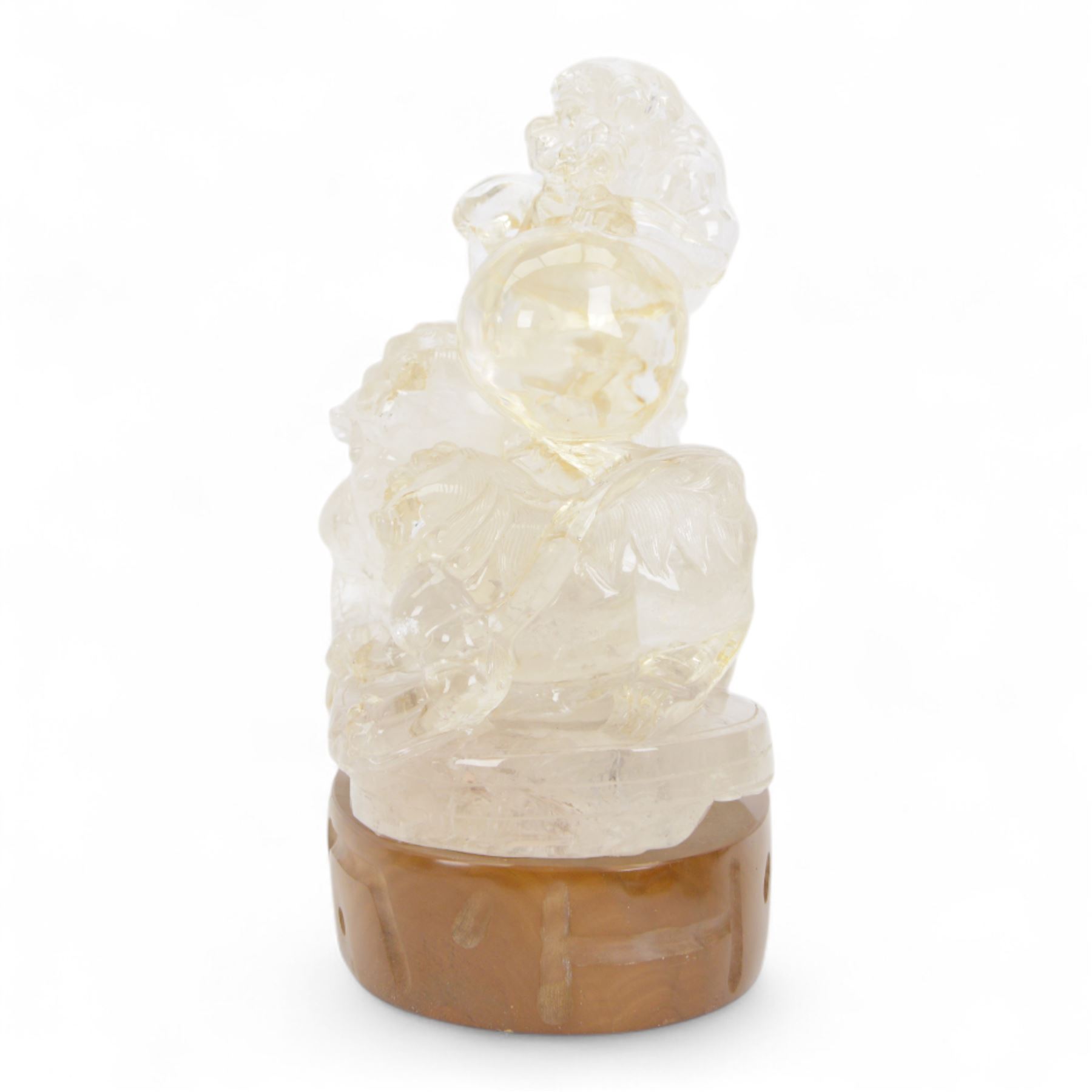 Chinses quartz carved figure group, modelled as three temple lions around a ball, upon an oval base, H20cm
