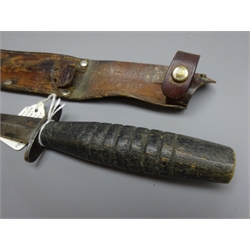  Two wooden handled Commando Knives, 16cm twin edged steel blade with brass cross guard, bold ribbed grip with sunken top retaining nut, L29.cm, leather scabbard engraved with South Sea Campaigns incl. Madras, Chittacong, Sumatra, Calcutta etc, another 17.5cm twin edged blade with steel cross guard and bold ebonised grip scratched with initials DCH with sunken top retaining nut, leather scabbard marked DCH, PAH and NRH, L30cm (2)  