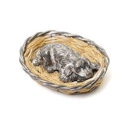 Silver model of a bird perched on a branch and with wooden base by Goldsmiths and Silversmiths Co. H5cm, small silver model of a pheasant on wooden base H2.5cm and a silver miniature model of a dog in a basket marked 925 and indistinct maker's mark L3.5cm (3)