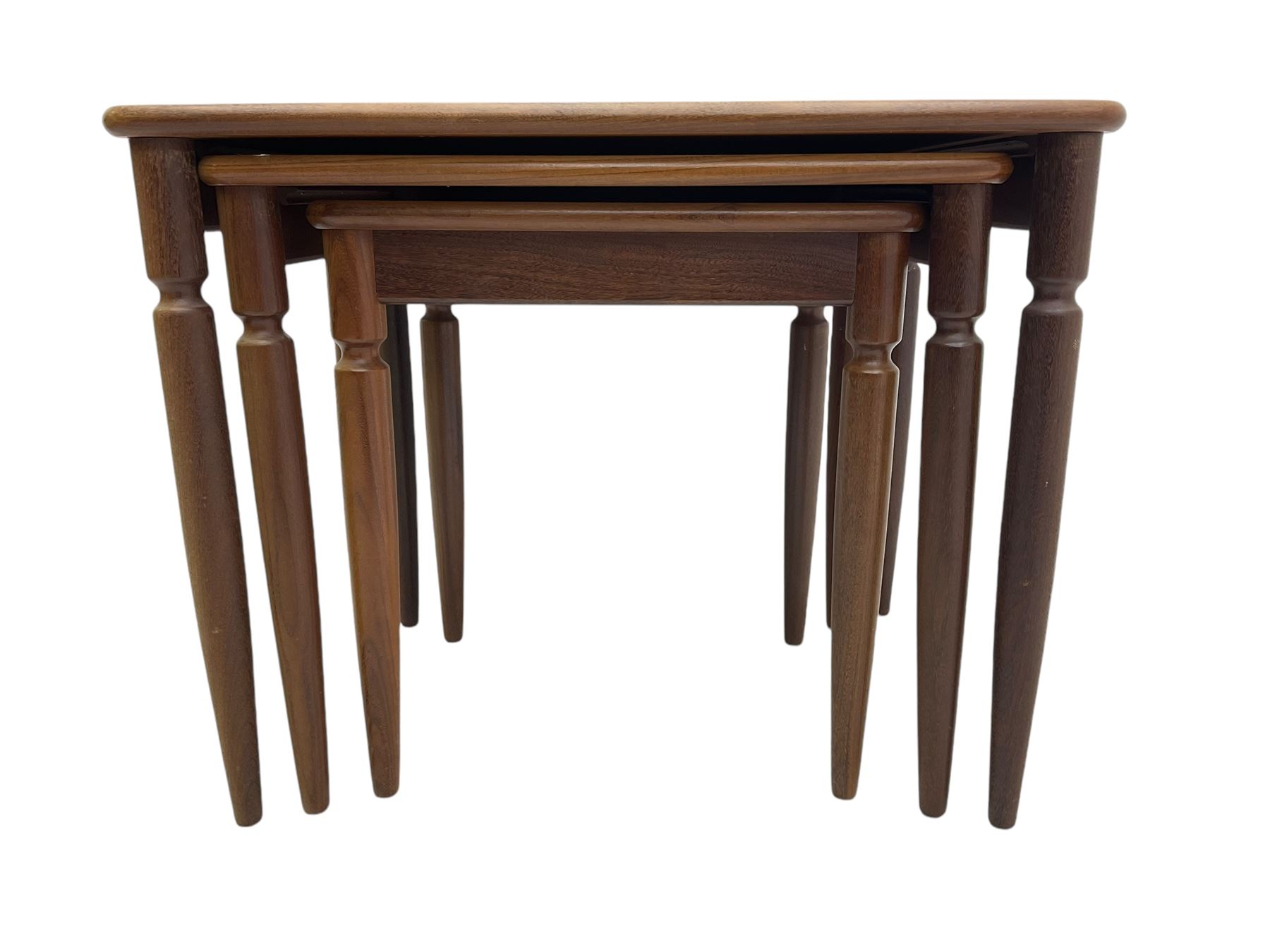 G-Plan - teak nest of three tables, rectangular top raised on turned supports
