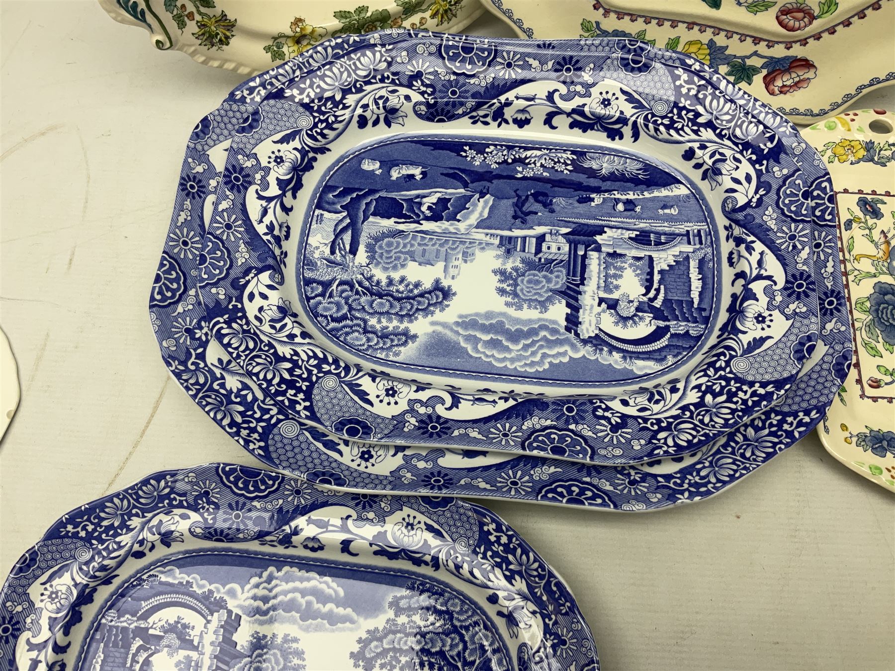 Three Spode Italian pattern platters, together with a three masons dishes of various sizes and two other plates  