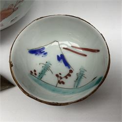 Chinese ceramic bowl, painted with floral and foliate decoration on a white ground, together with a similar much smaller Chinese bowl, painted with mountain scene to centre and covered by basket weave to exterior and a white metal mounted pear shaped scent bottle, largest bowl D11cm