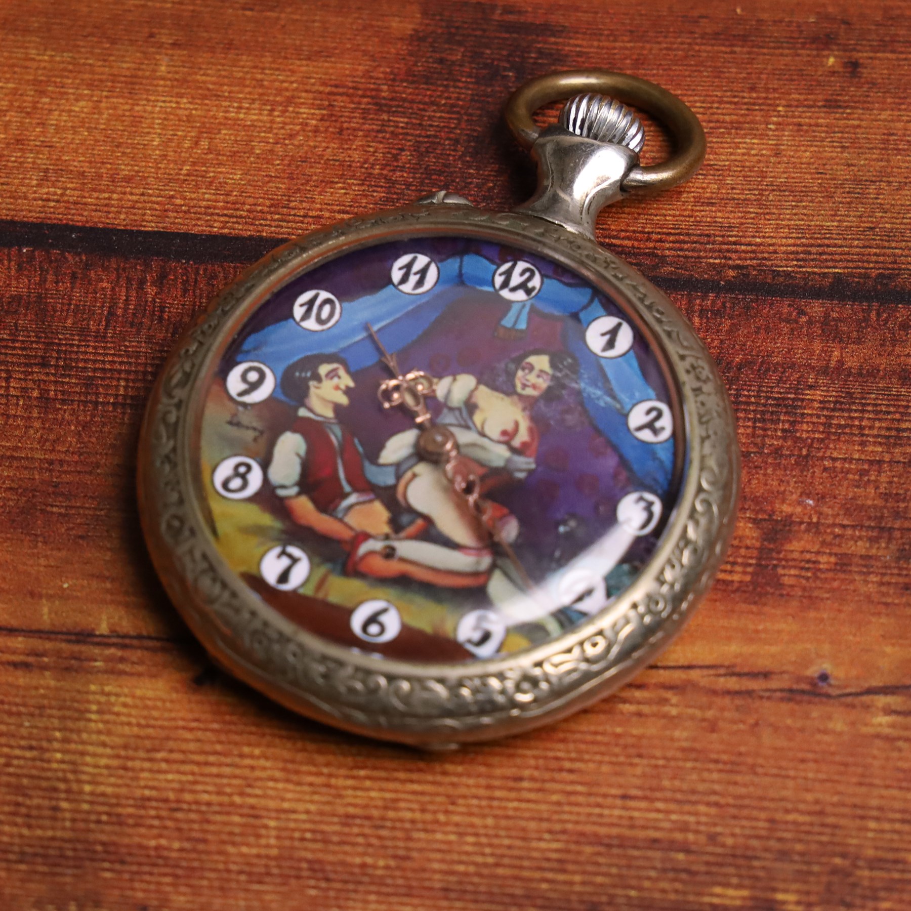 20th century silver plated pocket watch, the dial later printed with an erotic scene, D5cm