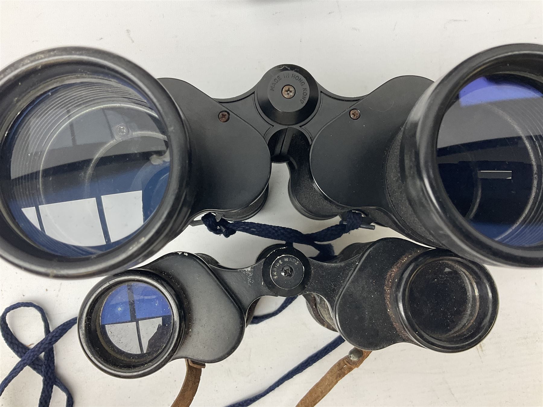 Nine binoculars to include Prinz 10x50, Prinzlux 10x50,  Ellgee Cadet 8x25, Mark Scheffel 35x50 etc, eight with cases
