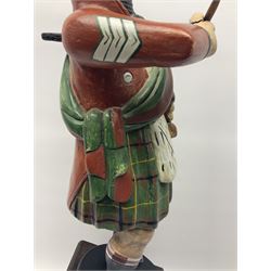 20th century painted tobacco advertisement in the form of a Scotsman wearing kilt  with a cigar, H80cm
