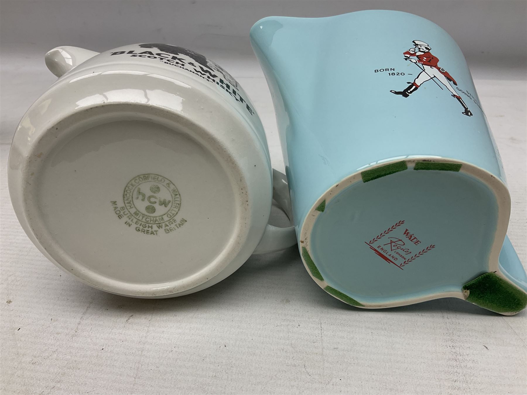 Six whisky water jugs, to include Wade Johnnie Walker, Haig, Black & White, etc