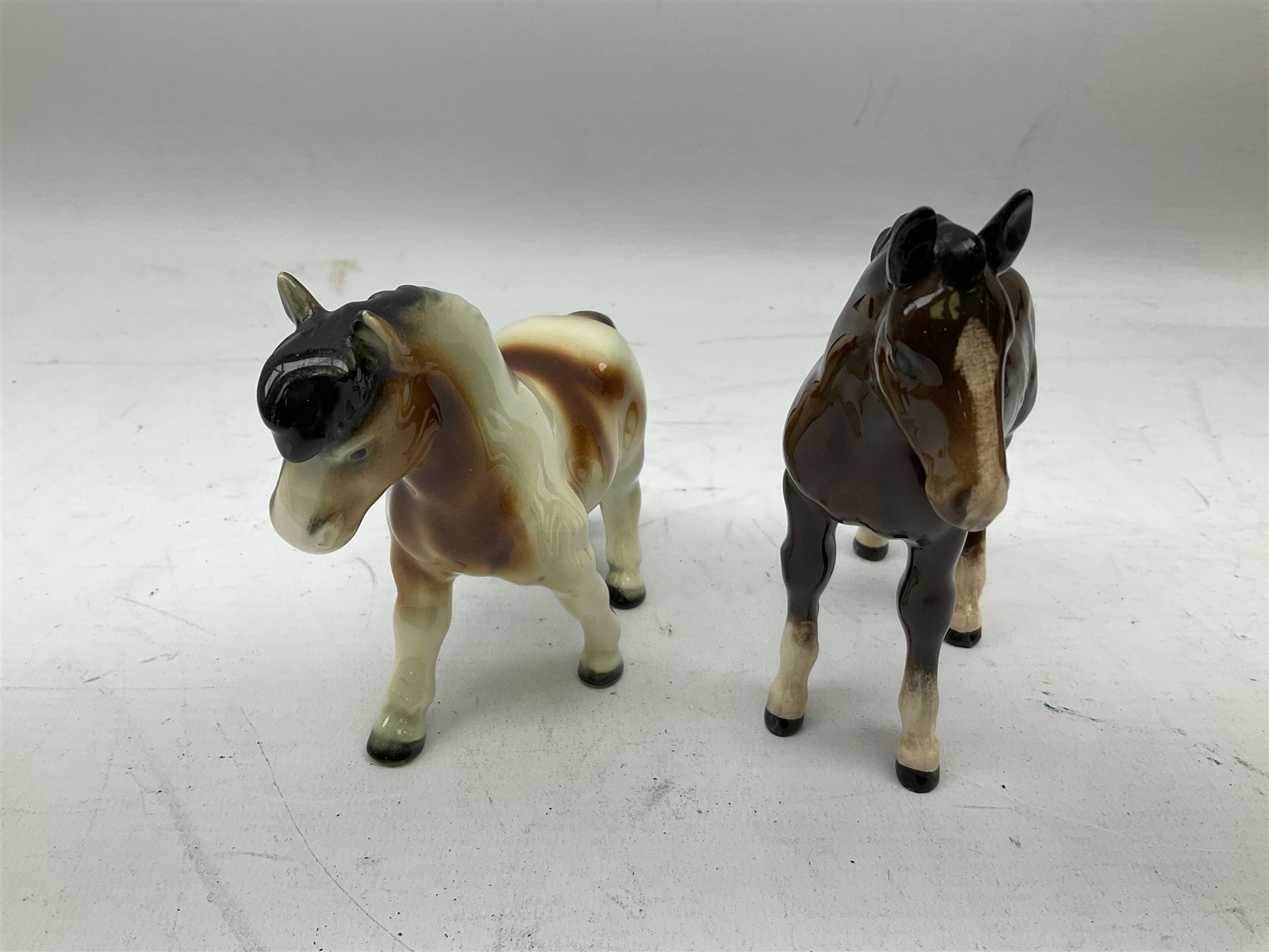 Seven Beswick figures of horses, including Connemara pony in grey no.1641, Arab in bay no.1265, large foal in grey no.947 etc, together with a Goebel figure of a horse (8)