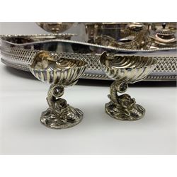 Pair of Mappin and Webb silver plate pierced pedestal bon bon dishes, together with other silver plate comprising teapot stand engraved with lion's head to centre, two cut glass claret jugs, two bottle coasters with acorn decoration, two open salts upon dolphin mounts, tea caddy, three piece cruet set and a large oval tray with pierced sides and upon four ball feet