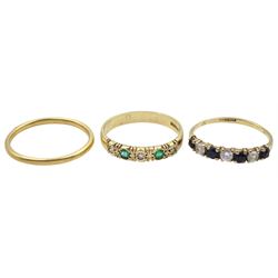 Gold five stone emerald and diamond ring, gold cubic zirconia ring, both hallmarked 9ct and a gold wedding band, hallmarked 18ct