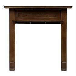 Early 20th century oak fire surround  with moulded mantle over shelf and plain pilasters w...