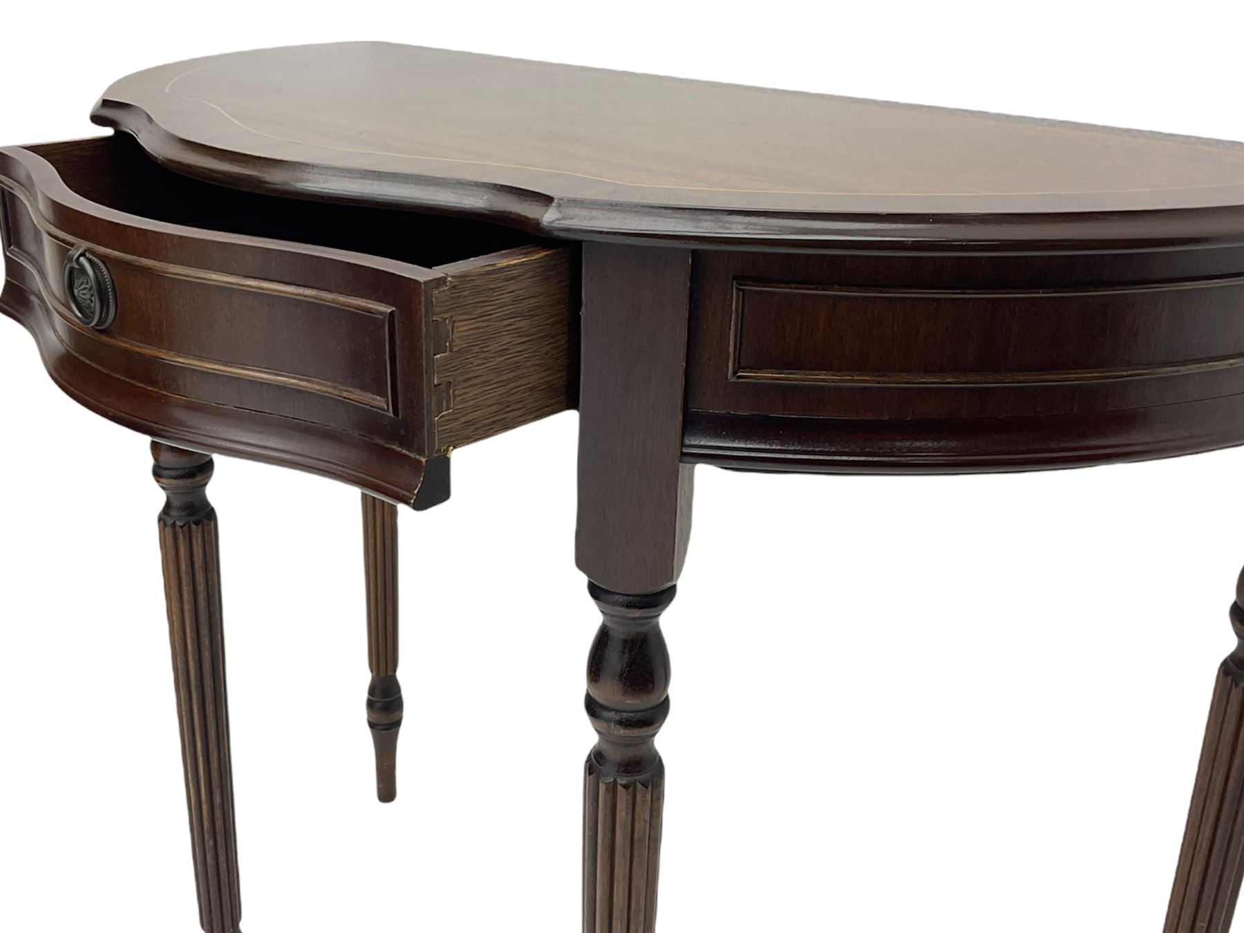 Victorian style mahogany console table, shaped moulded top on scrolled supports, moulded and canted base (W91cm, H76cm, D41cm), and a reproduction mahogany console or side table on reeded supports 