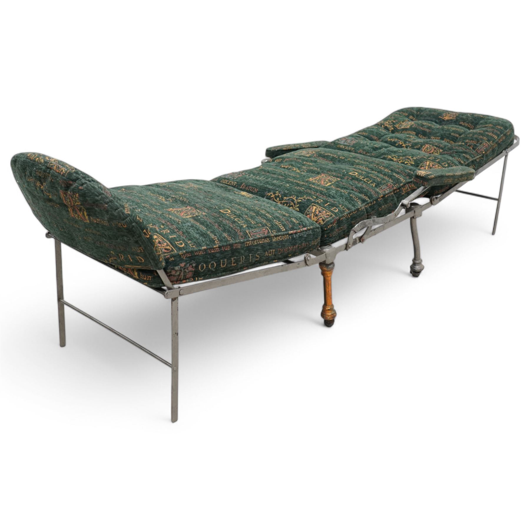 Victorian foldable day bed, button back padded arms, reupholstered in a green fabric with Latin script, turned feet with ceramic castors