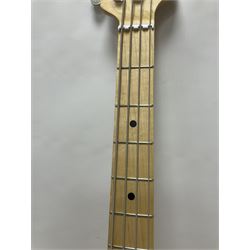 Ernie Ball Music Man Sting Ray 4 string bass guitar, in natural finish with roasted maple neck and tortoiseshell effect scratch guard, serial no 87485, in black Music Man hard case, guitar L114cm