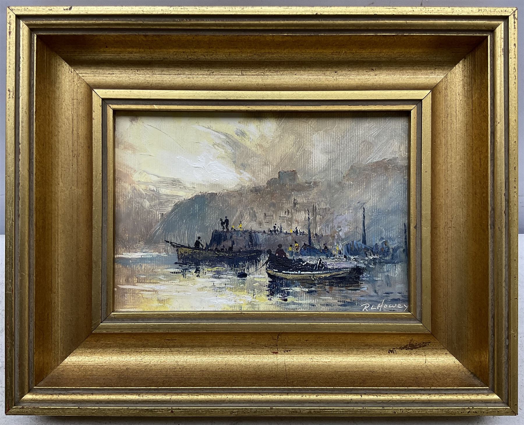 Robert Leslie Howey (British 1900-1981): Cobles off Tate Hill Pier Whitby, oil on canvas board signed 11cm x 16cm