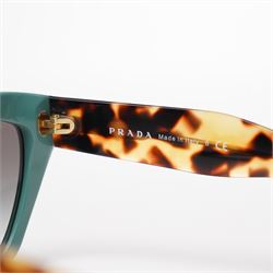 Prada - pair of cat-eye sunglasses, with green acetate frames and graduated tinted lenses, the arms in tortoiseshell finish with gold-tone ‘Prada’ branding, unused with original hard case and box