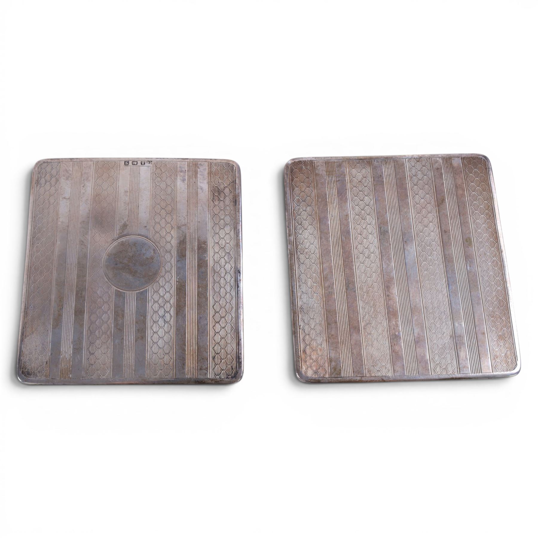 Collection of silver, including napkin rings, two vest cases, cigarette case covers and scandinavian 830 cake fork