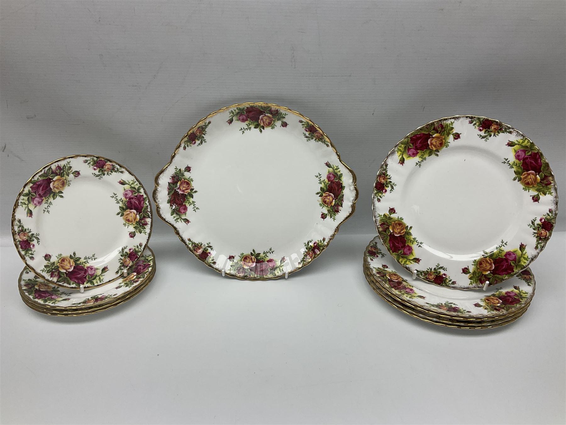 Royal Albert Country Roses pattern part tea and dinner service, to include teapot, four cups and saucers, four dessert plates, cake plate etc, (41)