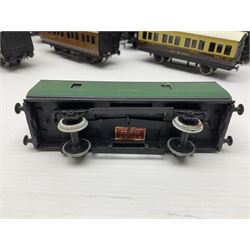 Exley '00' gauge - fourteen various coaches comprising four LMS maroon (3322 3rd, 2202 3rd, 6665 3rd and 388 Sleeping Car 3rd), LNER green/cream Buffet Car 21419, LNER teak 8639 1st, Southern green 6688 3rd, GWR brown/cream 3322 3rd, LNER 206 3rd, LNER 319 1st/3rd, SR green 351 3rd, SR green 188 Parcel Van, GWR 331 3rd and GWR 362 3rd; all unboxed (14)