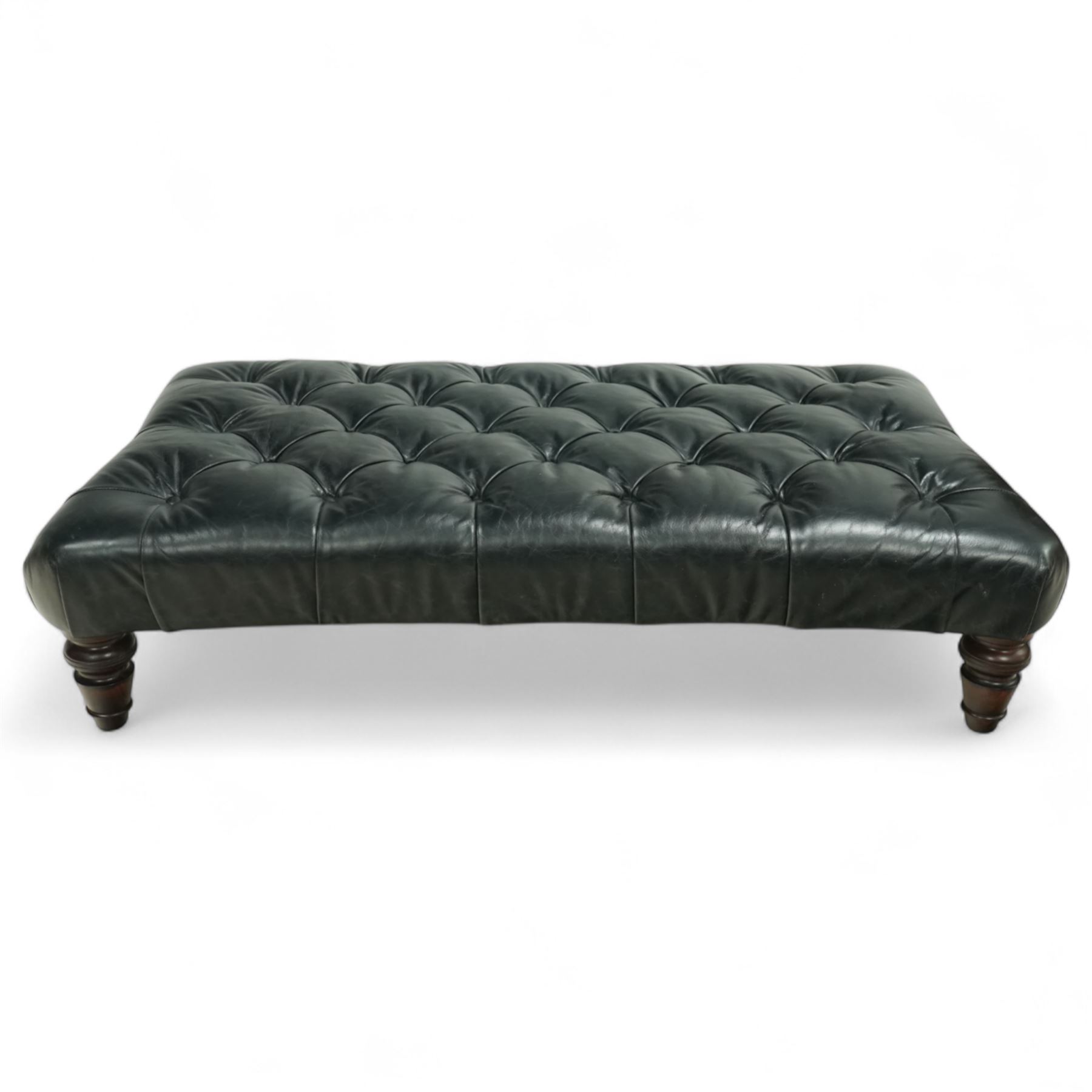 Tetrad – Contemporary black leather upholstered stool, deep button top with pulled finish, on turned stained hardwood legs