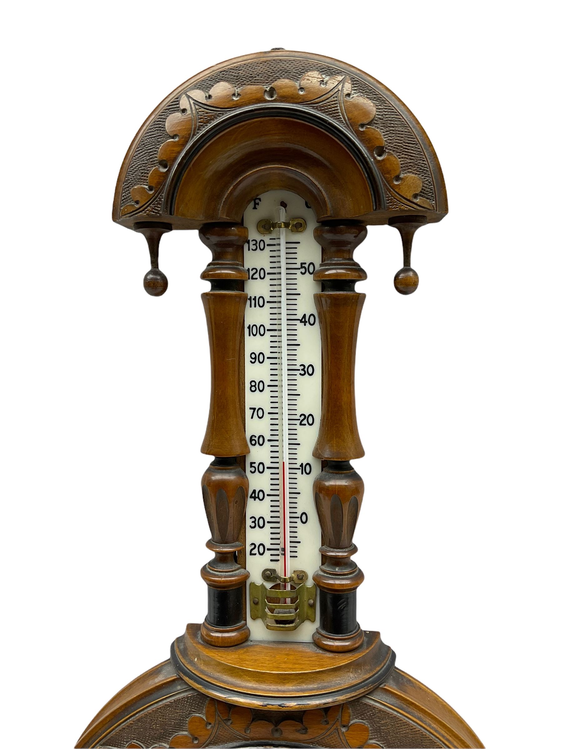 An Edwardian hall barometer with a compensated Aneroid movement by the German maker Julius
