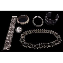 Collection of Indian silver including bangle with snake clasp, hinged bangle, torque bangle, bracelet, necklace and brooch