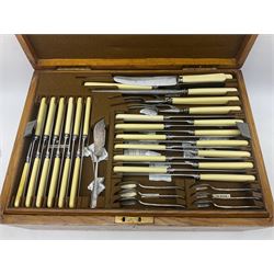 Mappin & Webb silver plated canteen of cutlery, the oak case with hinged lid two two removable trays, and sunken brass handles, H19cm, L52cm