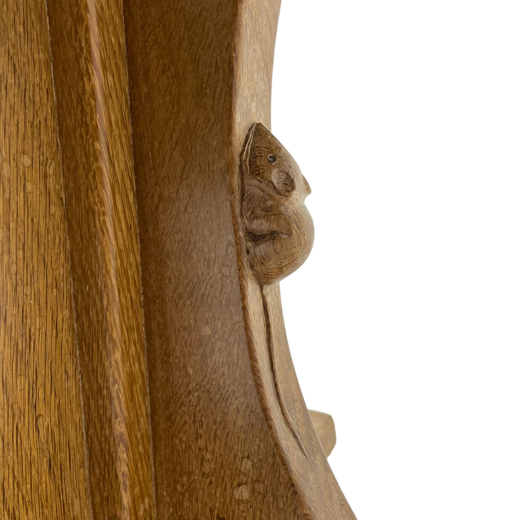 Mouseman - oak coffee table, octagonal adzed top on cruciform base, sledge feet, by the workshop of Robert Thompson, Kilburn