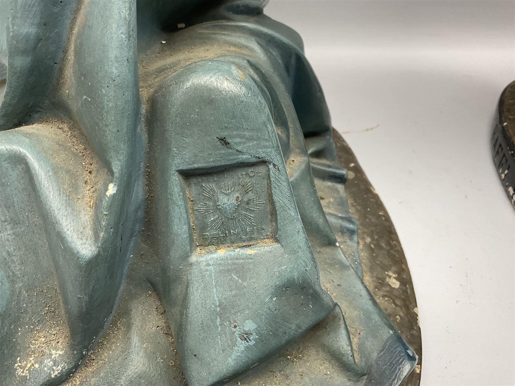 Two religious painted plaster figures of Mary and Joseph kneeling on oval plinths, with impressed mark 'Raffl et Cie Paris', H60cm 