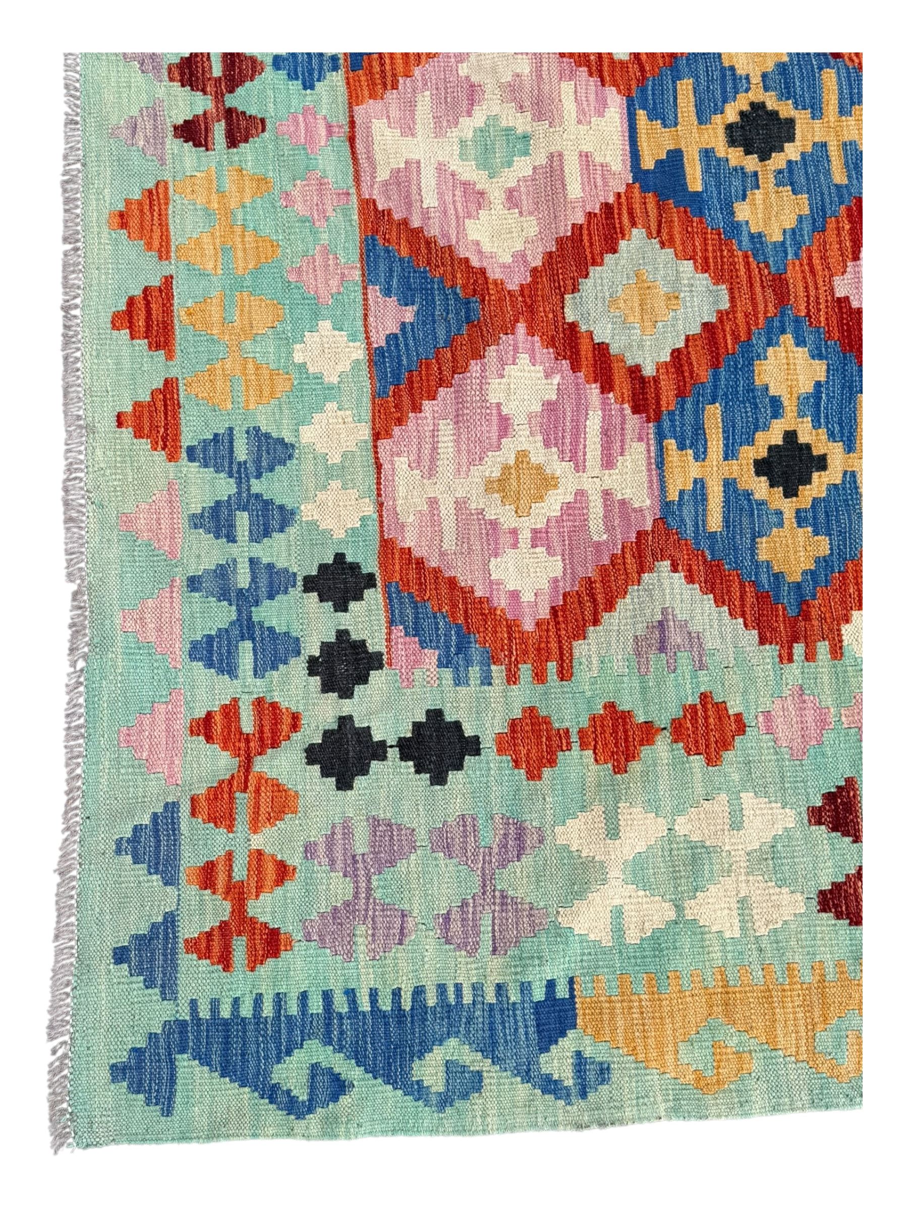 Kilim pastel ground rug, the field decorated with repeating multicoloured geometric diamond motifs, enclosed within matching geometric borders