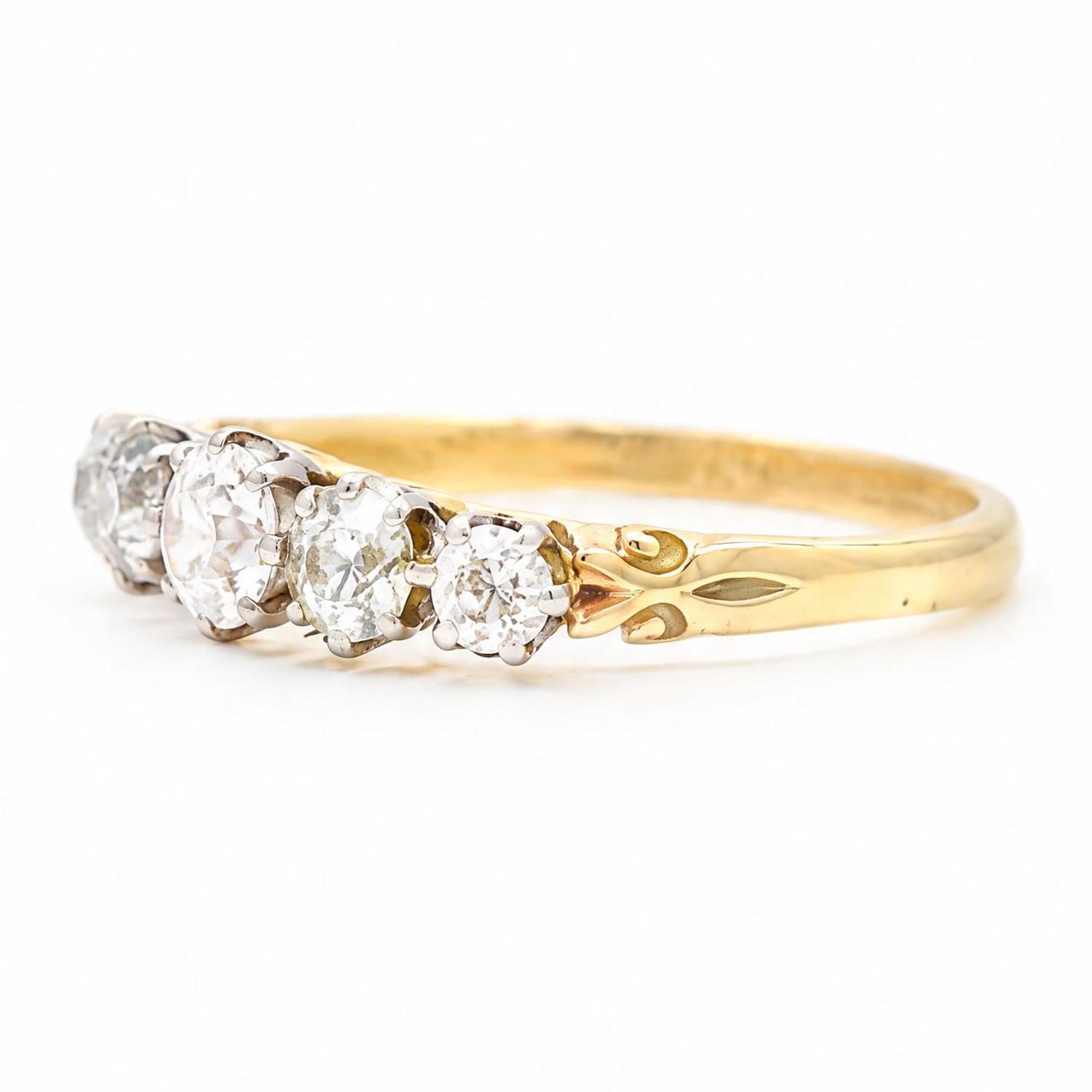 Gold diamond ring, set with five graduating old cut diamonds, stamped 18ct, total diamond weight approx 0.90 carat