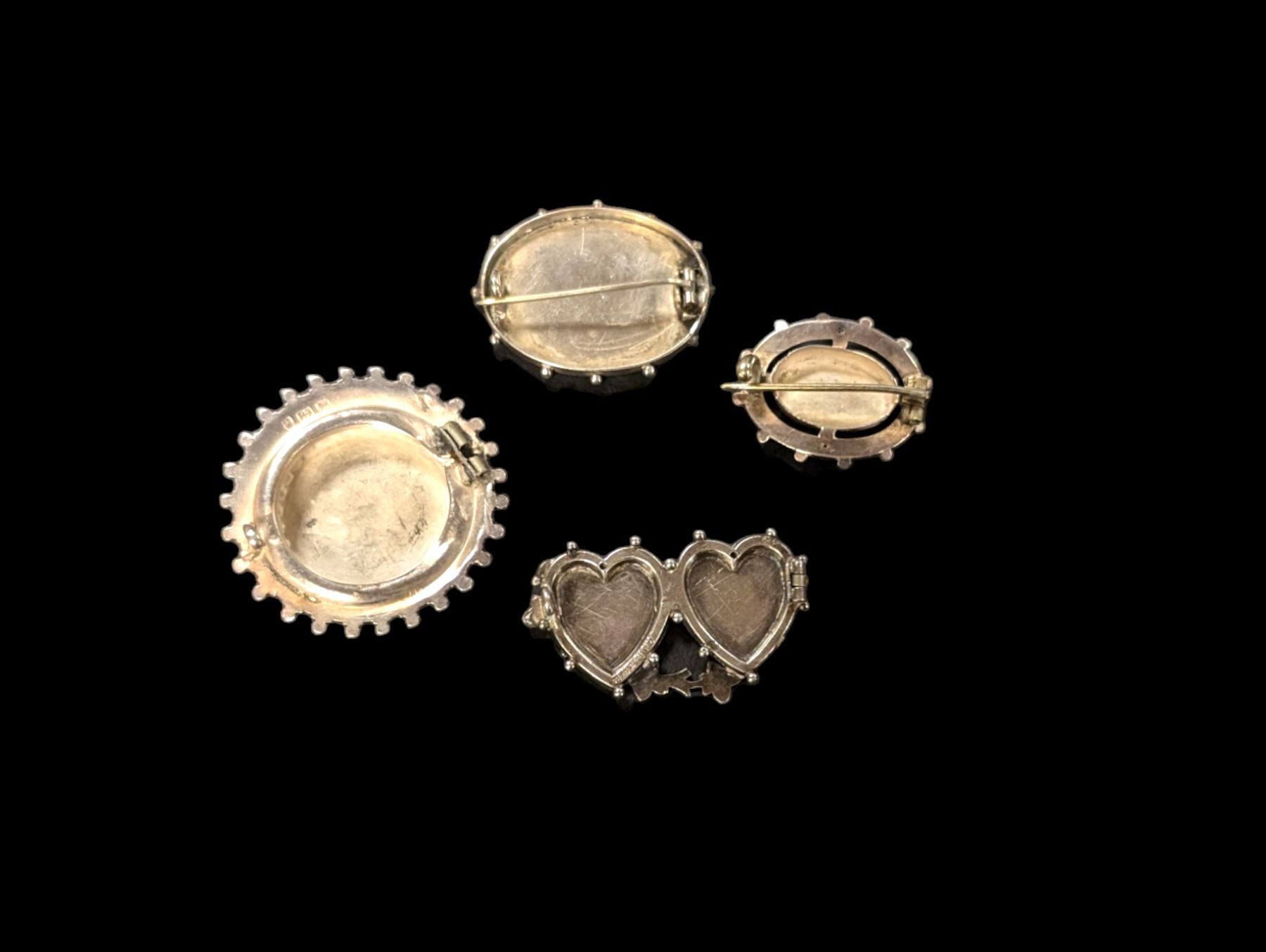 Victorian silver brooches, including one engraved with York Minster and a Mizpah brooch