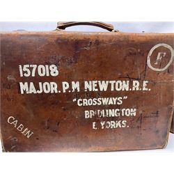 Early 20th century leather suitcase marked to the top 'Major P.M. Newton R.E. Crossways, Bridlington, East Yorkshire' 60 x 40cm; another similar leather suitcase marked W.D. to the lid; three post-WW2 respirators; and three unopened pairs of British Army N.B.C. (Nuclear Biological Chemical) No.1 Mk.III Trousers Protective (8)