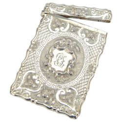 Victorian silver card case, of rectangular form with shaped borders, relief embossed with fruit and flowers and engraved with monogram, hallmarked George Unite & Sons, Birmingham 1875, H9.5cm, contained within fitted tooled leather case